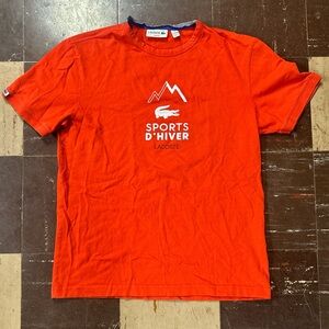 Orange lacoste winter sports tee